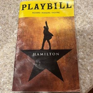 Hamilton playbill slightly discolored covered